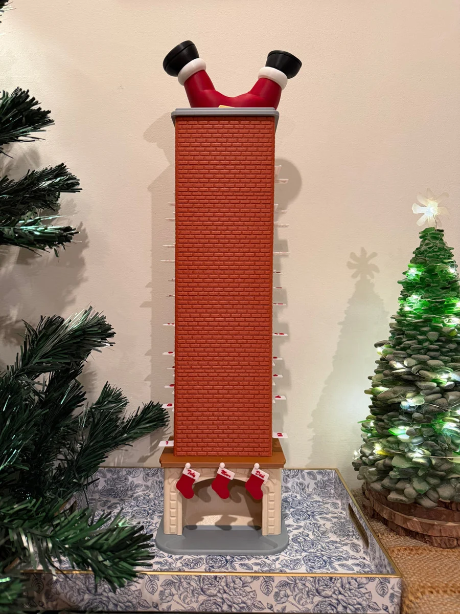 Santa Chimney Advent Calendar with Santa’s boots at the top, numbered clips and personalised stockings