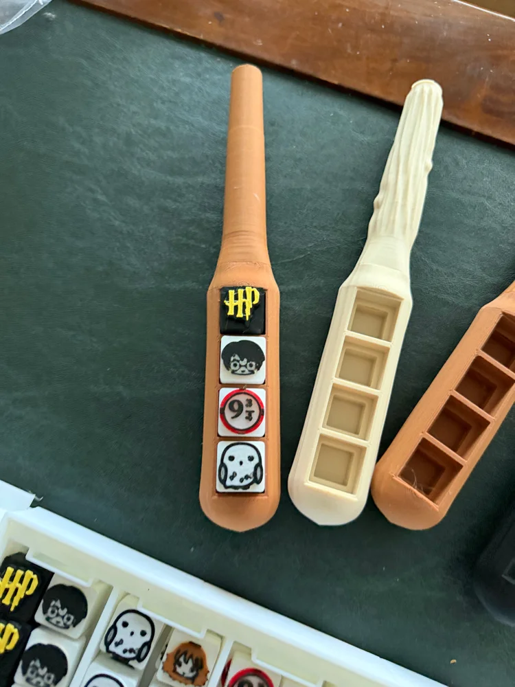 Magic Wand Clicker with four example keys beside other wand colour options