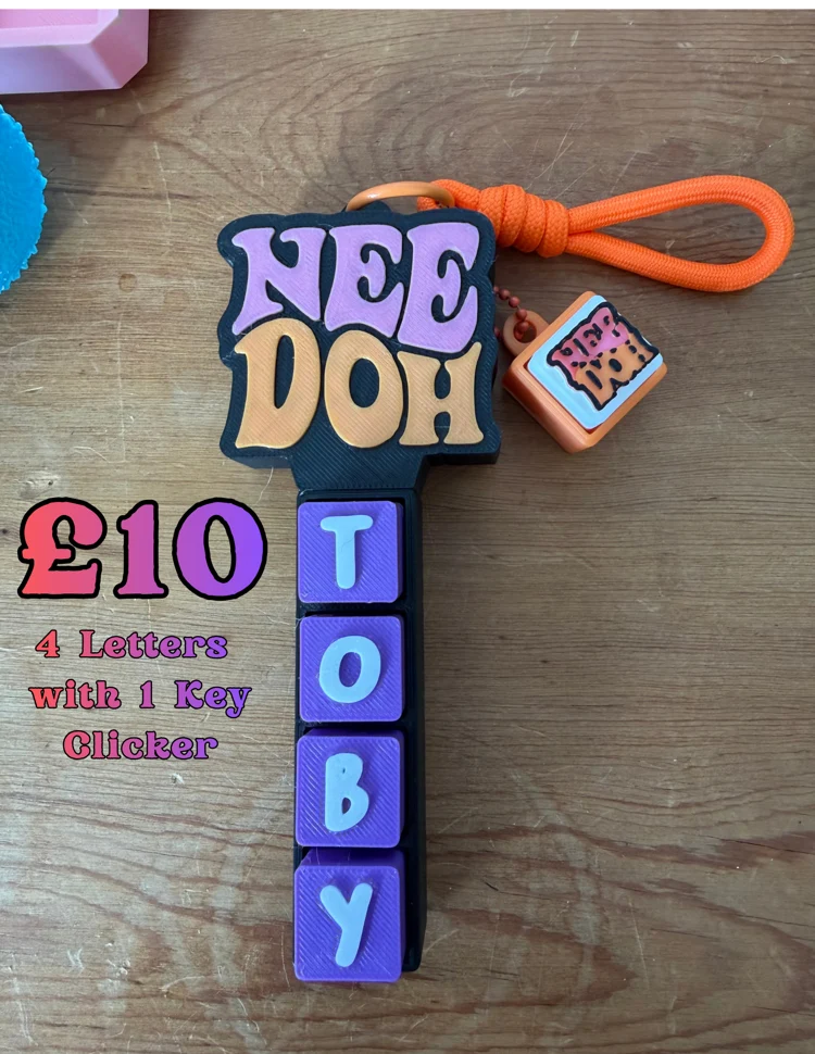 Personalised Toby name bar with purple letter keys, an orange loop and a One Key Clicker