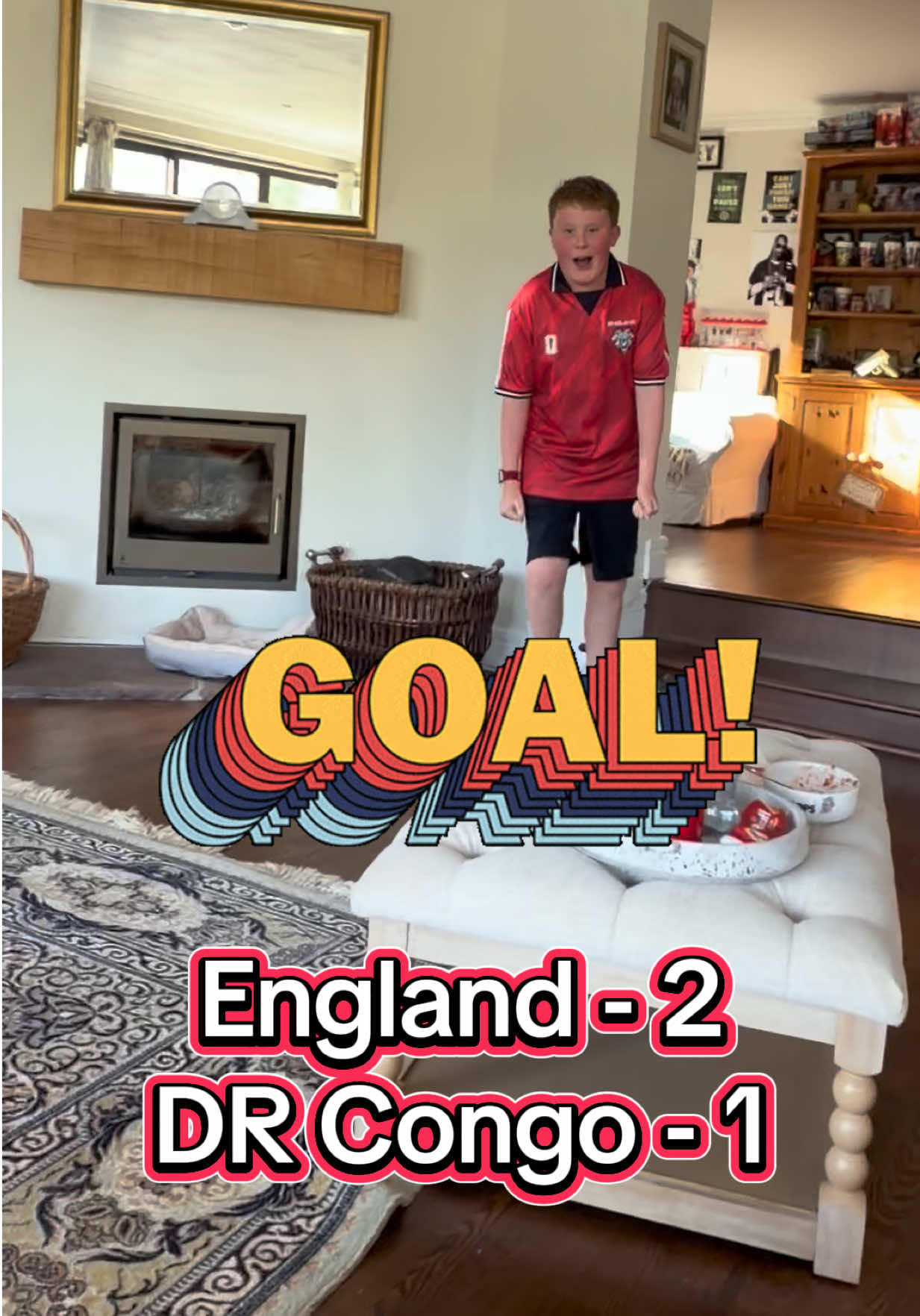 Toby celebrating an England football score on TikTok